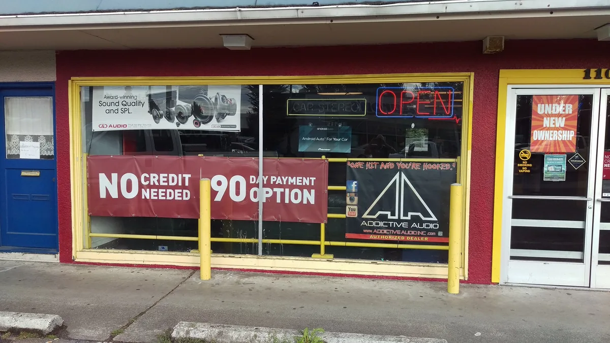 Audio Lab side storefront with Addictive Audio Authorized Dealer signage