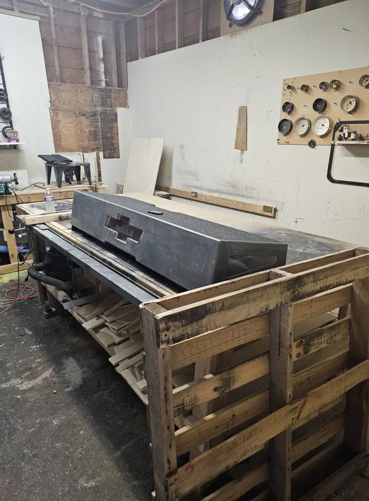 Massive custom subwoofer enclosure being built in the wood shop