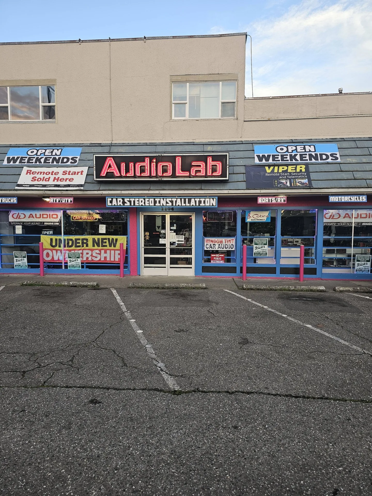 Audio Lab storefront with iconic red neon sign on State Ave